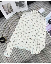 Chanel Women's Coconege Turtleneck Long Sleeve Ski Ribbon Top Cream